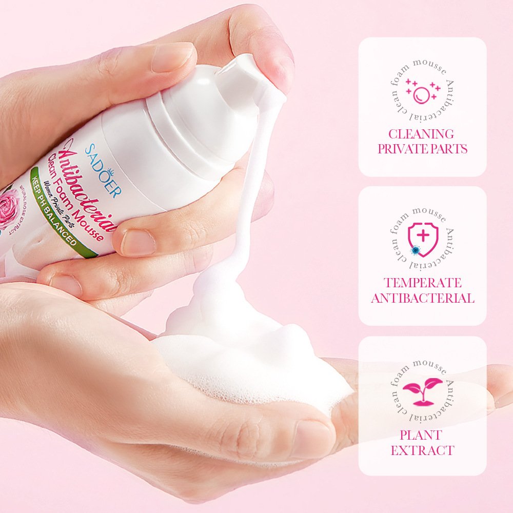 Fine feminine cleansing foam dispensed onto hand